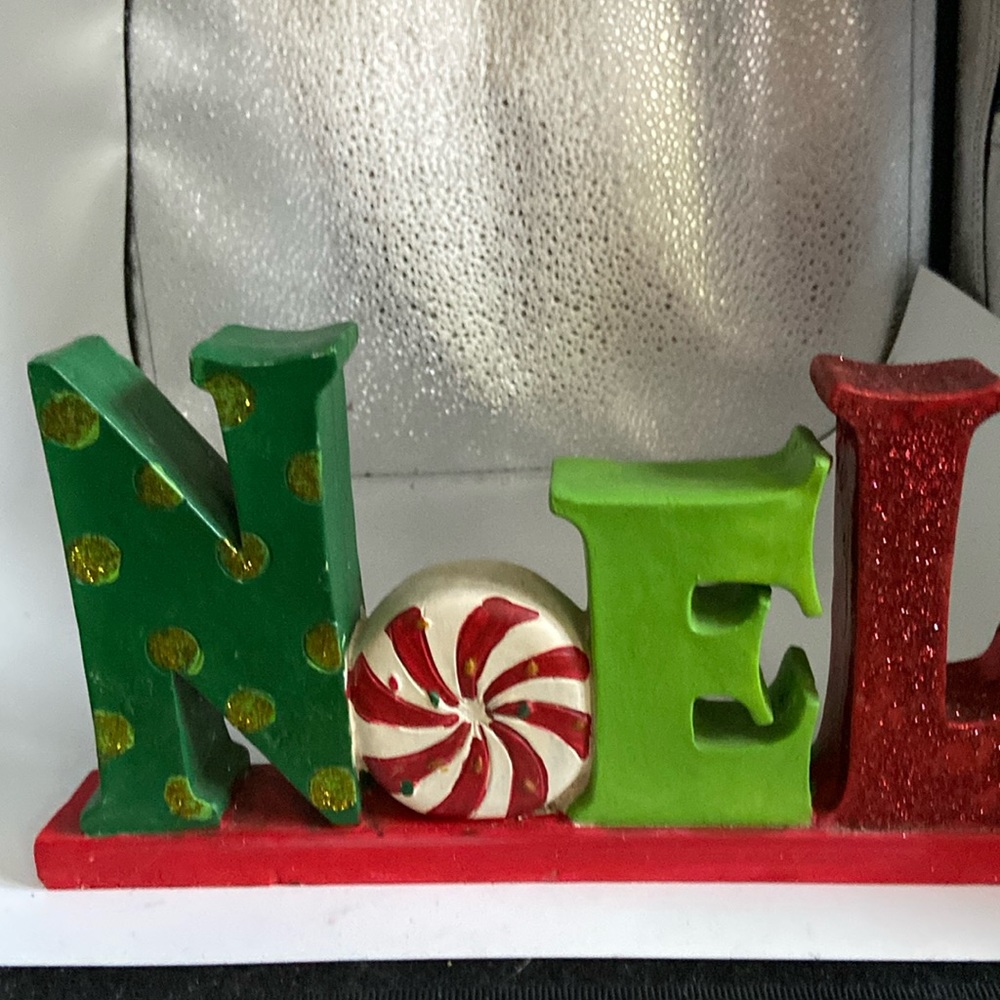 Noel.  Christmas display red green and white 5” x 10”